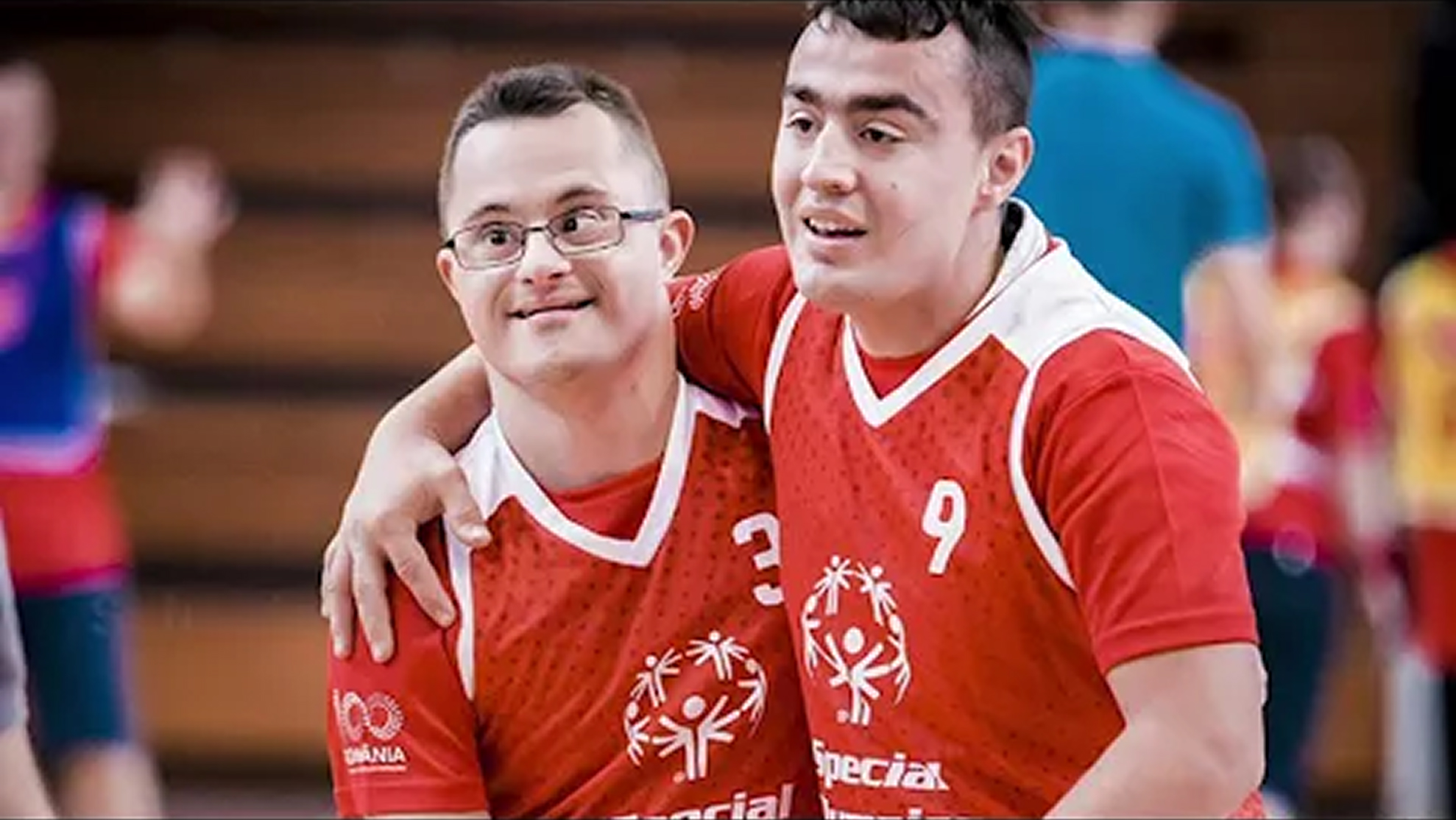 two athletes smiling