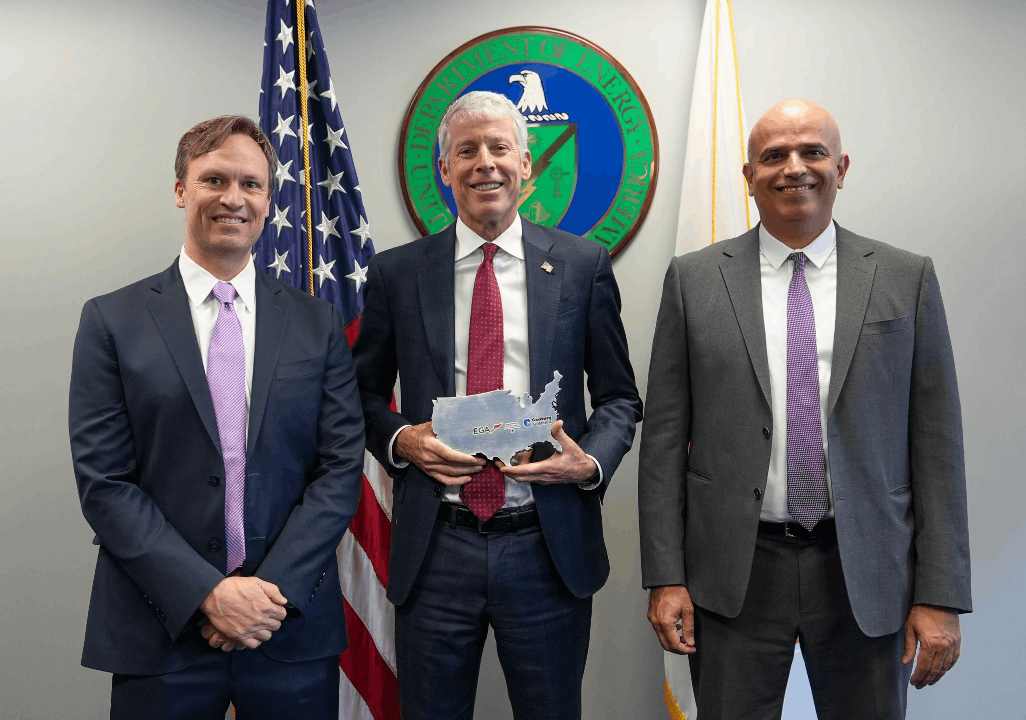 three men standing together smiling