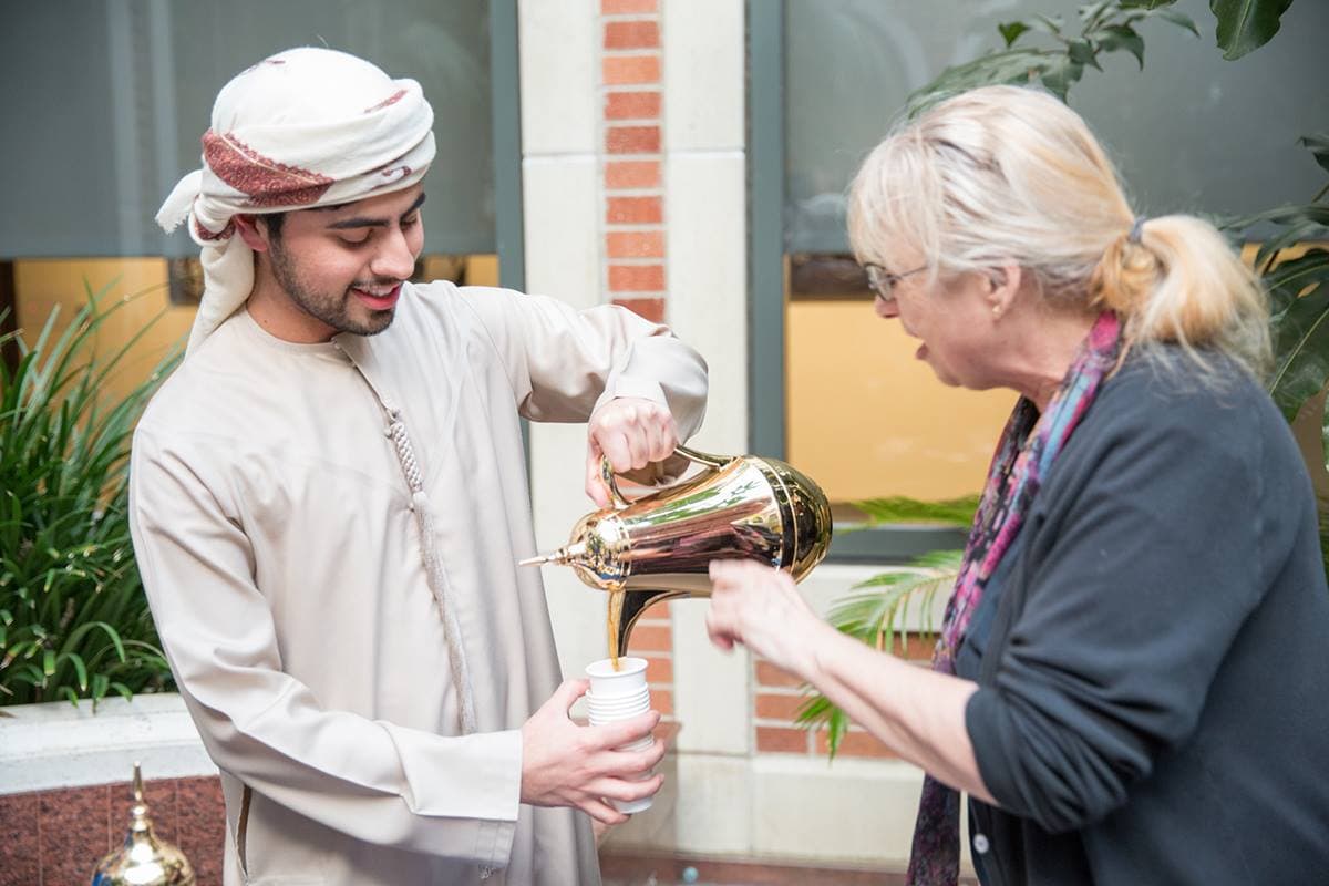 United Arab Emirates students discuss culture, heritage and offer a little Emirati hospitality with traditional coffee and dates to guests at the Fowler Museum at UCLA. - Jan. 2015