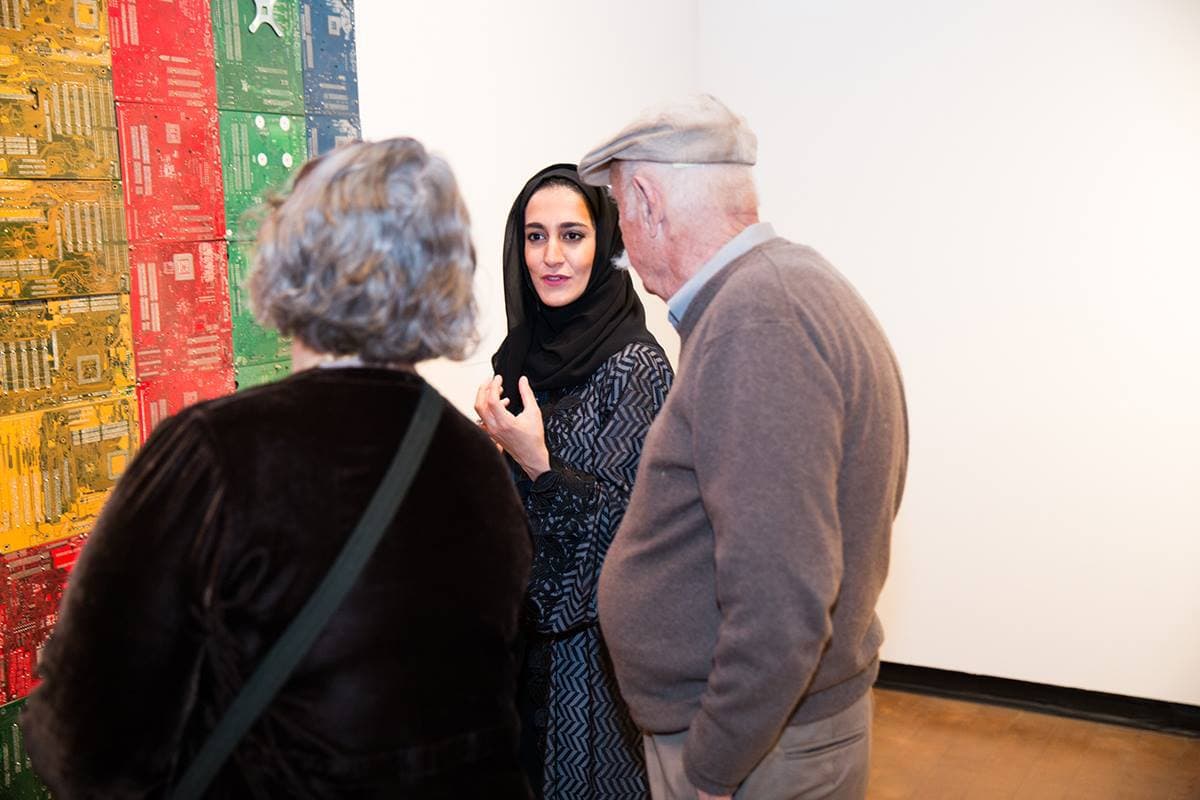 Guests enjoying the variety, creativity and innovative work by United Arab Emirates artist at the official opening of Past Forward, Contemporary Art from the Emirates at the Fowler Museum at UCLA.  - Jan. 2015