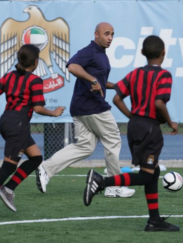 ambassador playing soccer