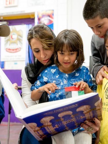 woman reading to children