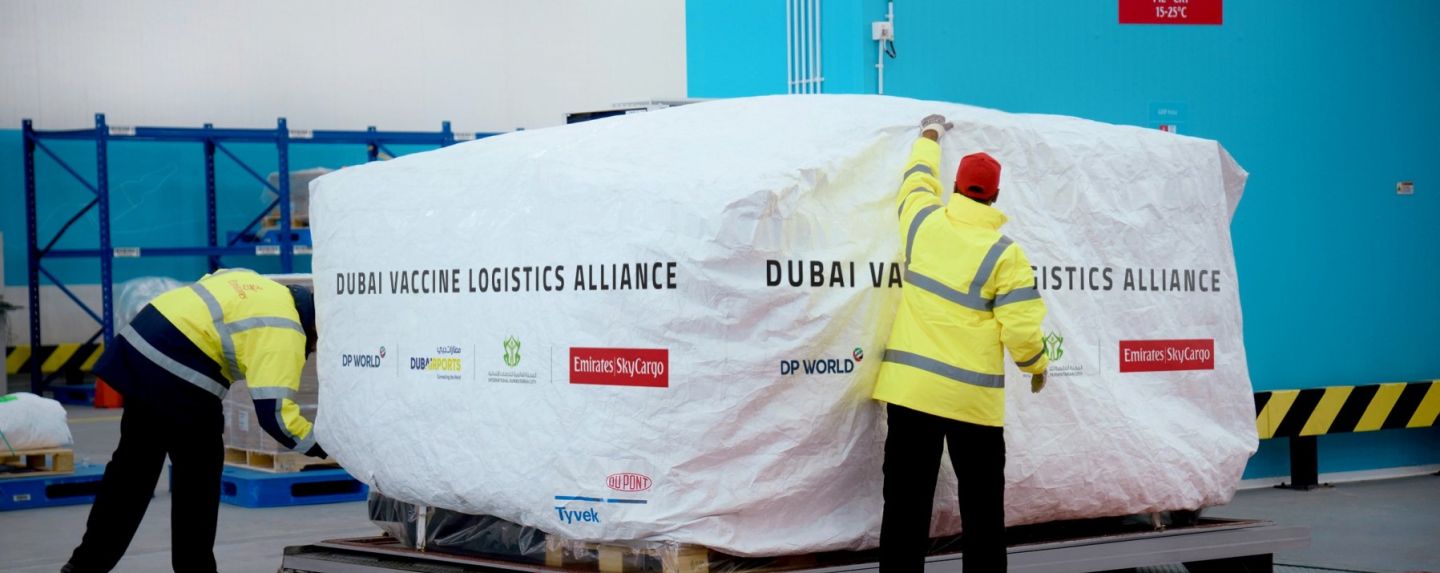 Men unloading vaccine shipment