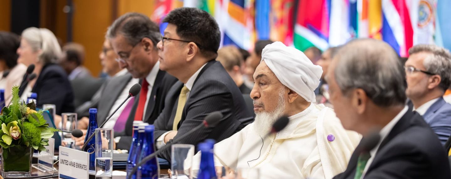 bin bayyah at conference table   big