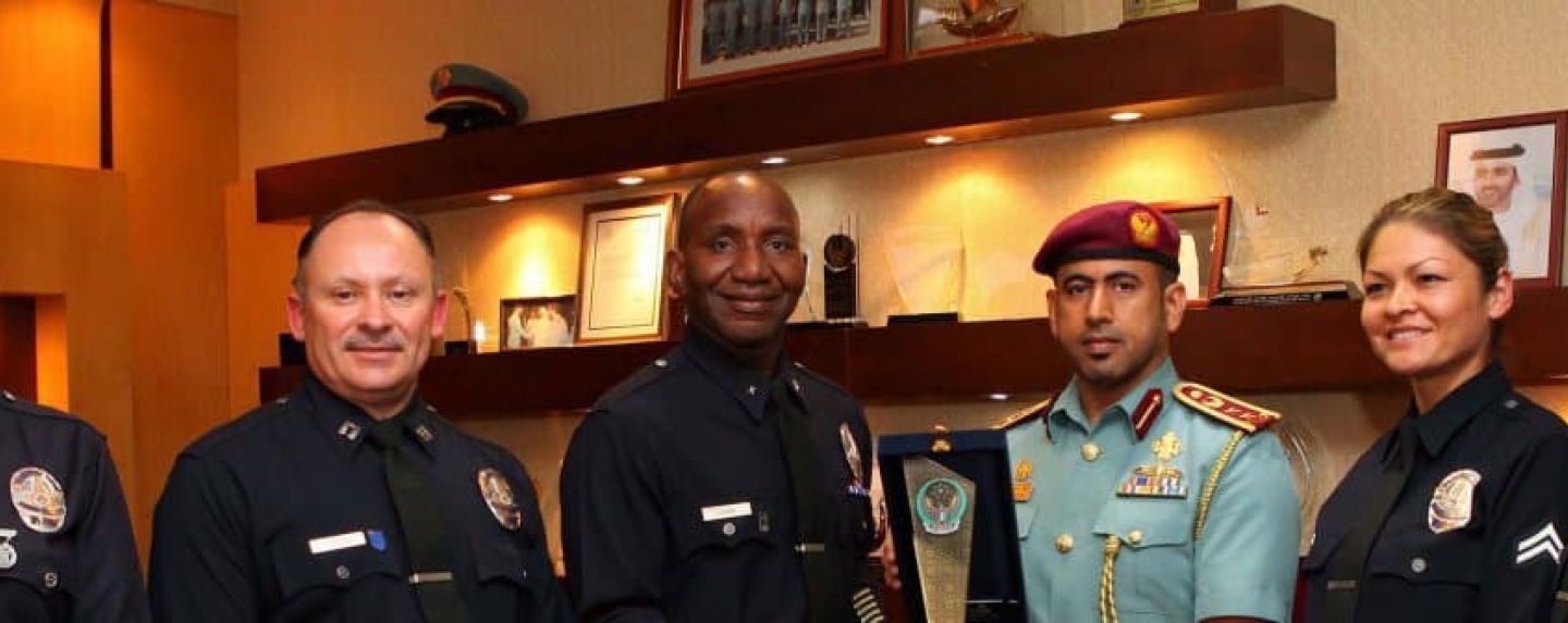colonel al shamesi presenting a commemorative shield to head of the us delegation photo me newswire