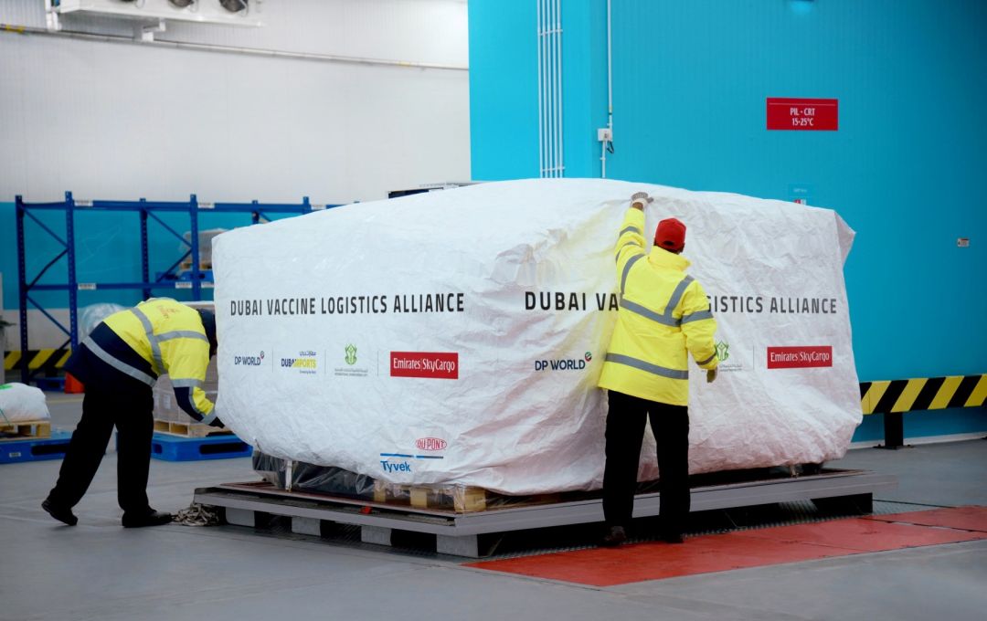 Men unloading vaccine shipment