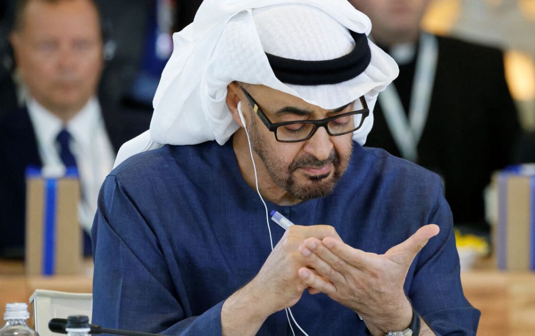 United Arab Emirates' President Sheikh Mohamed bin Zayed Al Nahyan takes notes as he attends a working session on Artificial Intelligence (AI), Energy, Africa-Mediterranean at the Borgo Egnazia resort during the G7 Summit in Savelletri near Bari, Italy, on June 14, 2024. — LUDOVIC MARIN/AFP via Getty Images