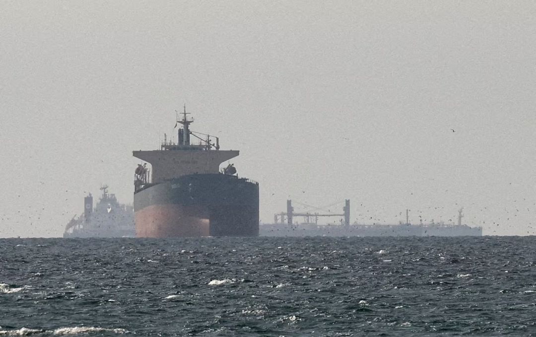 Cargo ships in the Persian Gulf near the Strait of Hormuz, as seen from northern Ras al-Khaimah, United Arab Emirates, amid the US-Israeli conflict with Iran. Picture: REUTERS/Stringer/File Photo (Stringer)