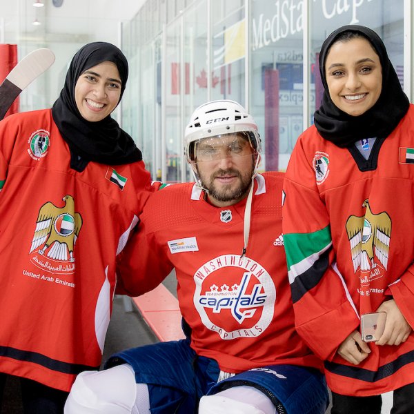 two UAE hockey players and Alex Ovechkin